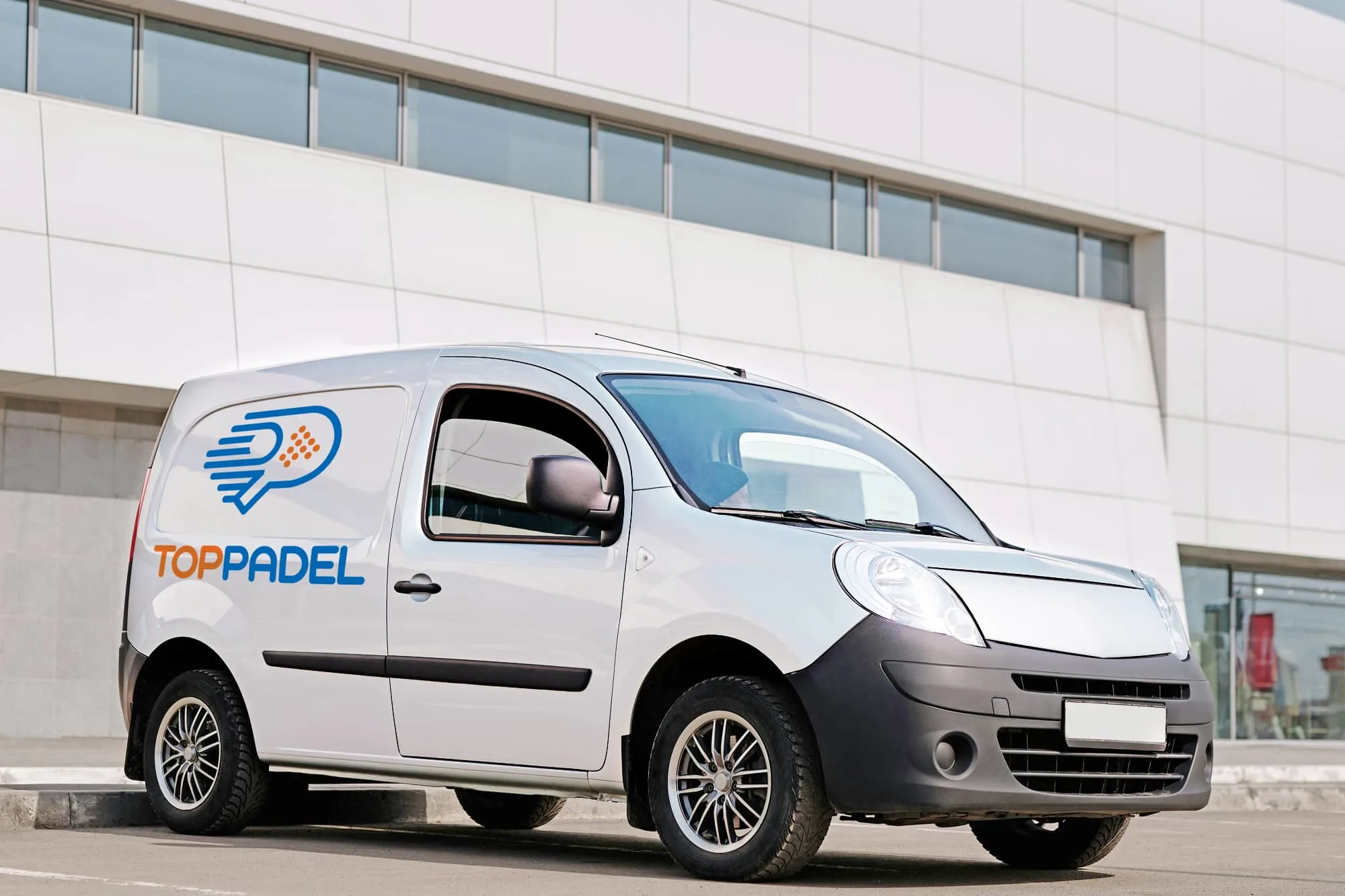 Top Padel logo design on a white van