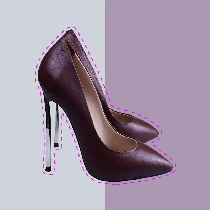 Pair of burgundy leather high-heeled pumps outlined in pink with a split background of 2 colours.