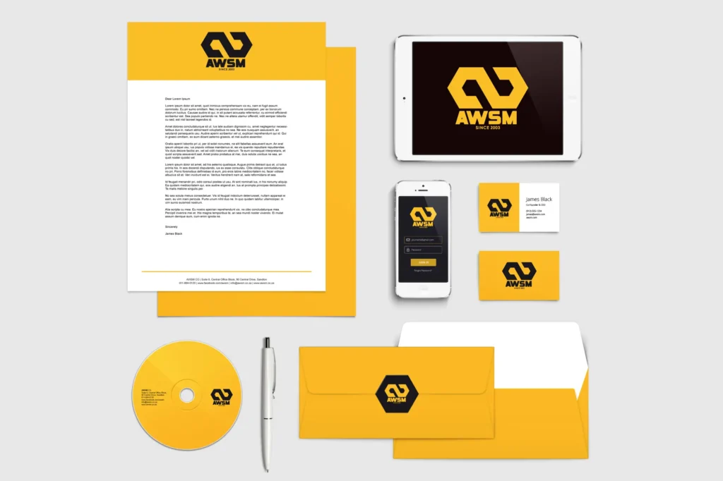 Corporate stationery in yellow and black theme. Includes letterhead, tablet, smartphone, business cards, envelope, CD, and pen with "AWSM" logo.