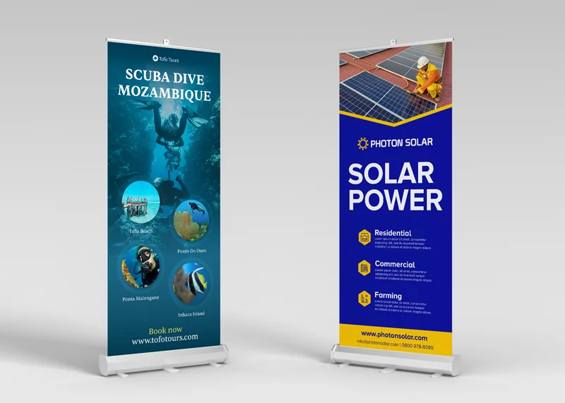 Two roll-up banners displayed: the first with scuba diver in blue ocean promoting "Scuba Dive Mozambique," and the second featuring solar panels promoting "Photon Solar Power."
