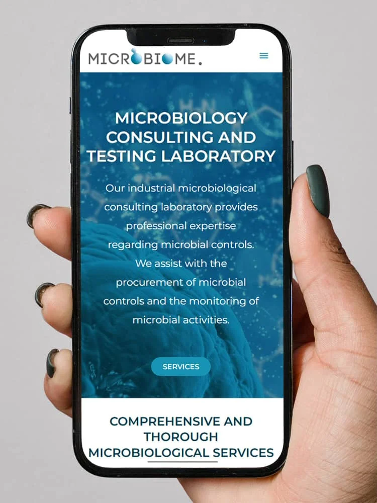 Smartphone screen displaying a mobile-friendly view of Microbiome's website
